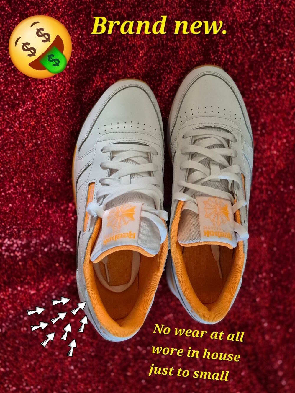 Reebok Ladies White Sneakers with Orange Accents.. Very Classy Look.